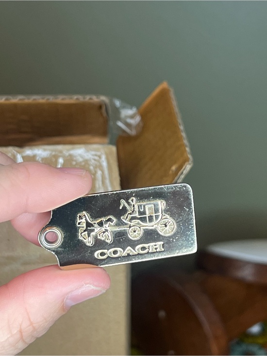 Coach Handbags - LORI ONLY Coach Gold Tone Carriage Logo Tag